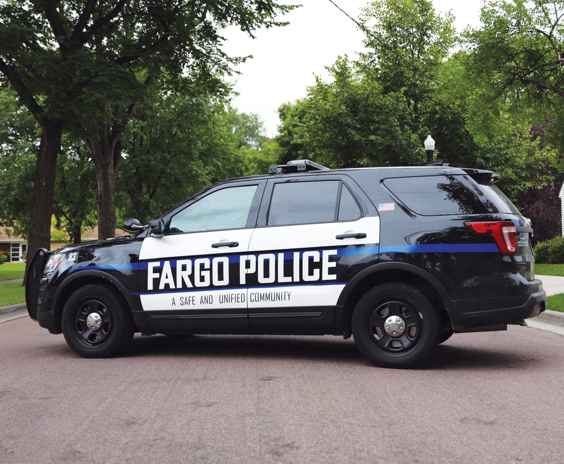 Patrol vehicles outside a police department